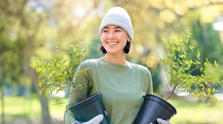 woman-planting-trees-earth-day